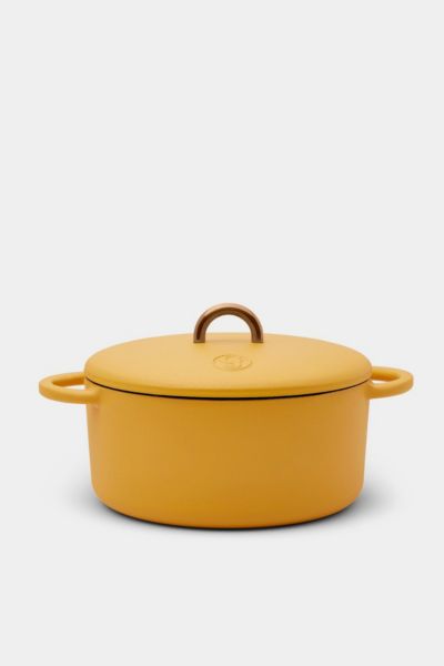 Shop Great Jones Dutch Baby 3.5-qt Cast-iron Dutch Oven In Mustard At Urban Outfitters