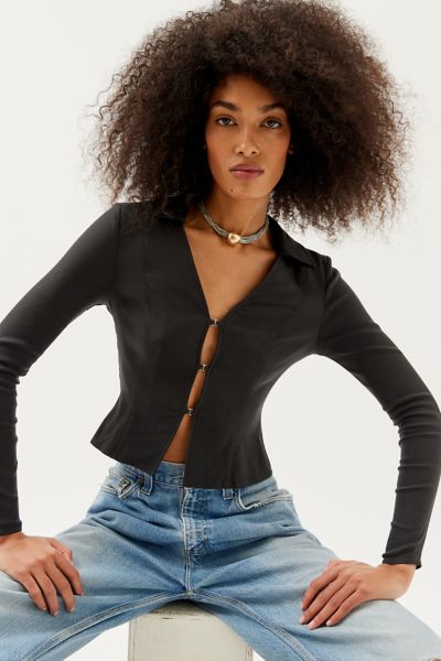 MOTEL RANDA PEEKABOO LONG SLEEVE TOP IN BLACK, WOMEN'S AT URBAN OUTFITTERS 