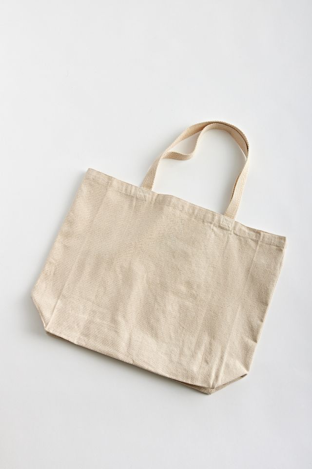 UO Smile Patch Distressed Canvas Tote Bag  Urban Outfitters Mexico -  Clothing, Music, Home & Accessories