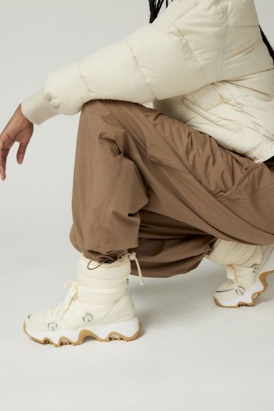 Sorel Kinetic Impact Puffy Lace-up Snow Boots In Chalk/sea Salt