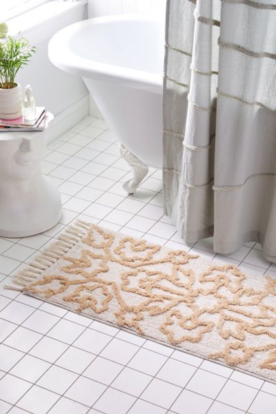 Shop Urban Outfitters Orlie Tufted Runner Bath Mat In White At