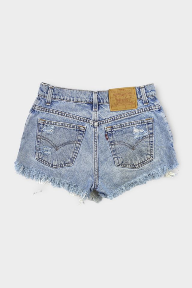 Vintage Levi's® Medium Wash Distressed Cut Off Levis Shorts | Urban  Outfitters