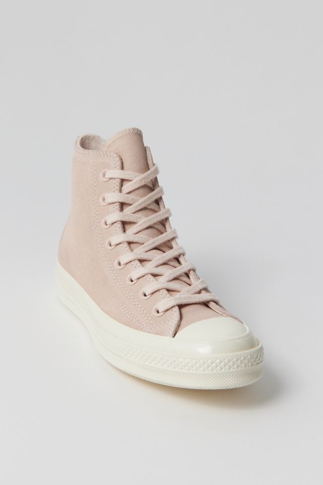 Pink leather best sale converse high tops