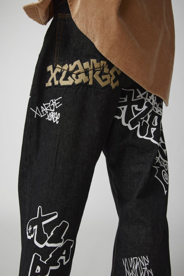 大人気 XLARGE GRAFFITI DENIM PANTS 散りばめられたデザイン◎ 大人気 XLARGE GRAFFITI DENIM PANTS 散りばめられたデザイン