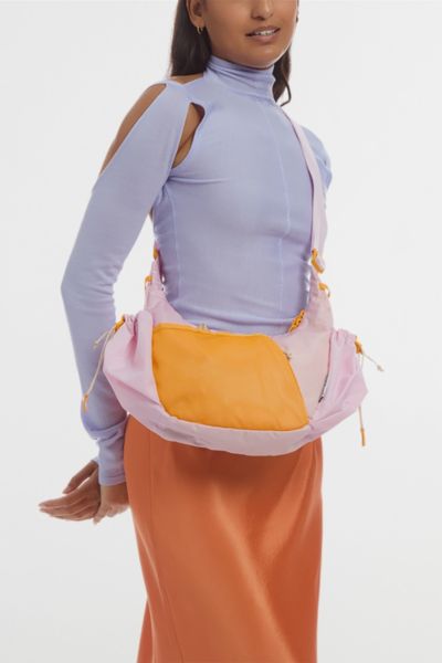 BABOON TO THE MOON CRESCENT CROSSBODY BAG IN PINK, WOMEN'S AT URBAN OUTFITTERS 