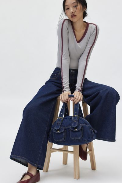 Shop Bdg Denim Duffle Shoulder Bag In Raw Denim, Women's At Urban Outfitters
