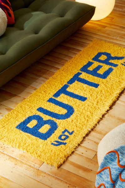 Shop Urban Outfitters Butter Tufted Shag Rug In Yellow At