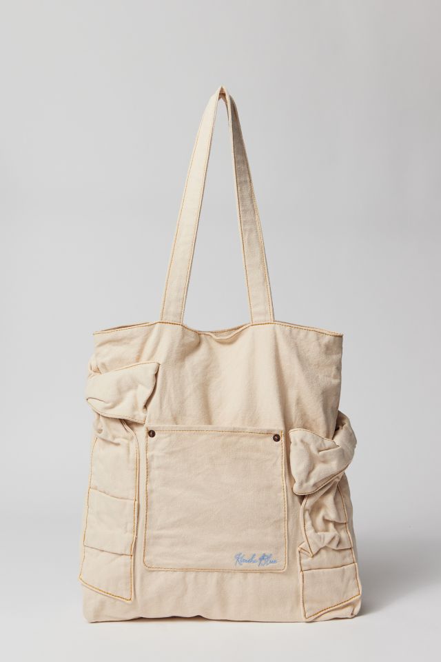 Kimchi & Blue Kimchi Blue Suede Zip Lip Tote Bag, $98, Urban Outfitters