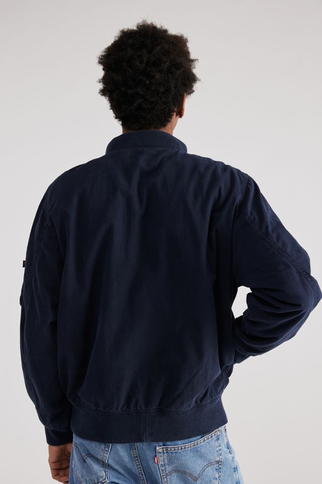 Alpha Industries US Navy Deck Hooked Bomber Jacket | Urban Outfitters