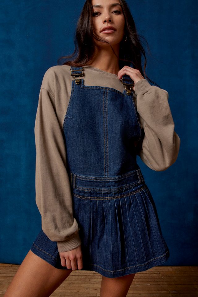 overall denim mini dress Blu Pepper Dandelion Print this denim mini dress combines comfort with a trendy silhouette Free People Women's Edie Denim