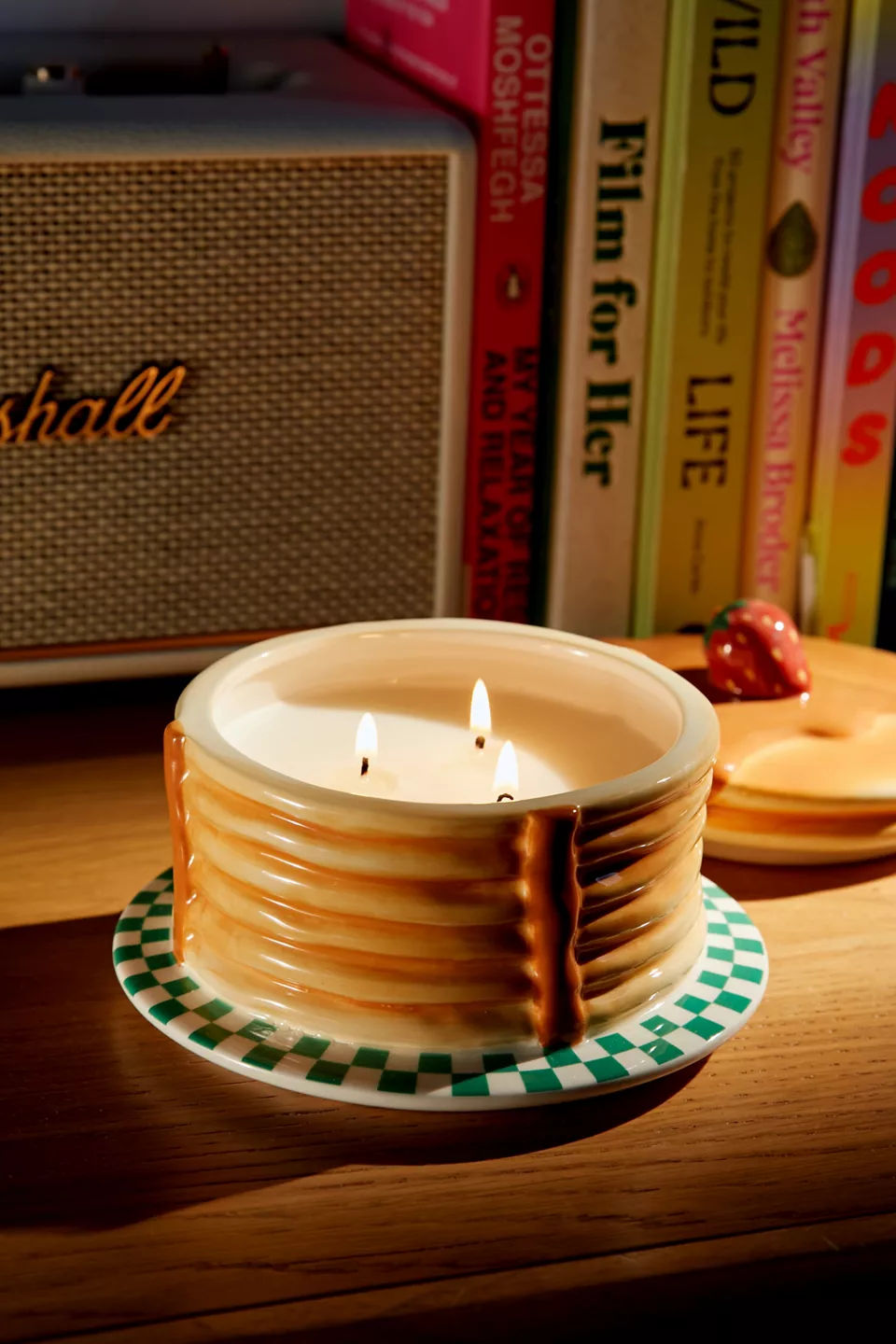A candle shaped like a stack of pancakes
