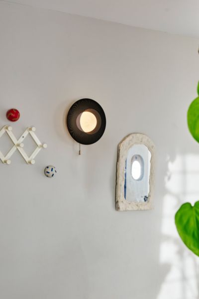 WOOJ DESIGN THE HELIOS PLUG-IN SCONCE IN MATTE BLACK AT URBAN OUTFITTERS 