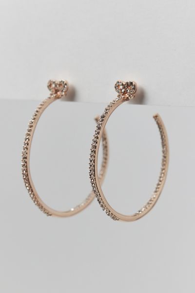 BETSEY JOHNSON CRYSTAL BOW HOOP EARRING IN ROSE, WOMEN'S AT URBAN OUTFITTERS