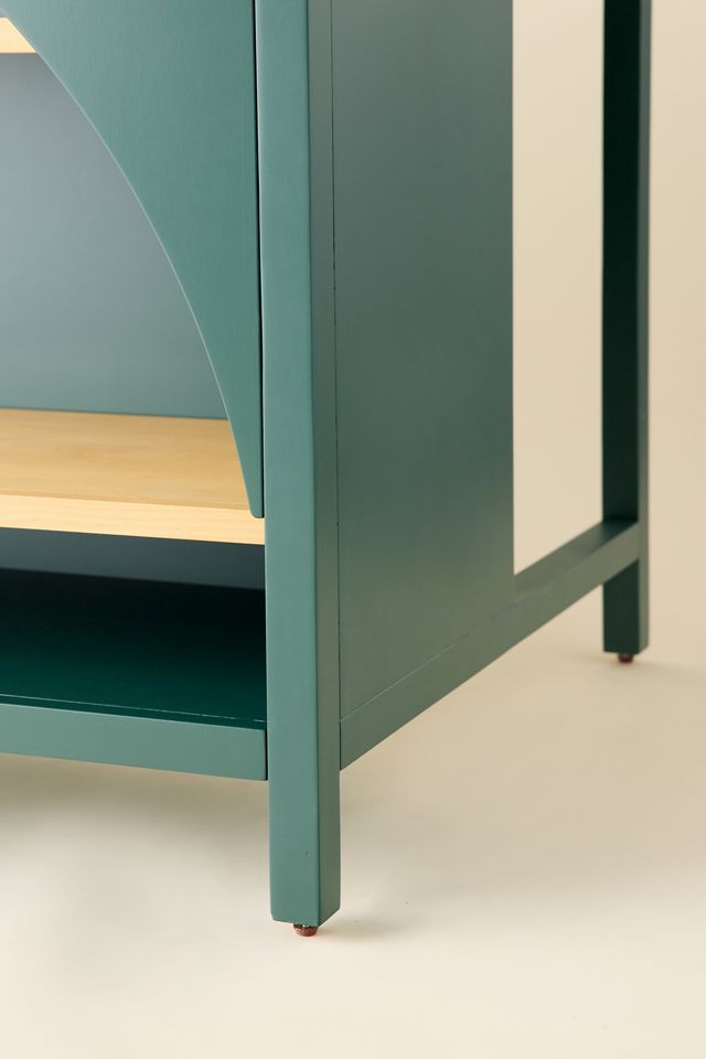 Close-up of leg and panel on teal kitchen island