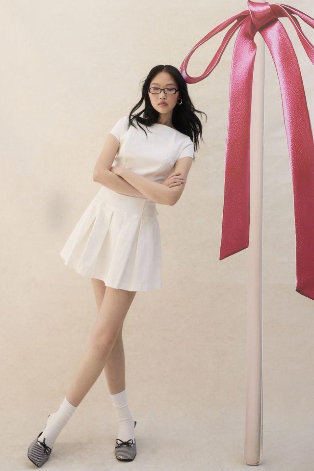 UO Bryan Bow-Back Pleated Drop Waist Denim Mini Dress #1