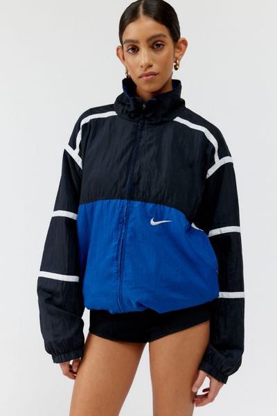 Shop Urban Renewal Vintage Branded Oversized Windbreaker Jacket In Cool, Women's At Urban Outfitters In Blue