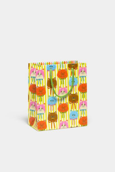 RED CAP CARDS RED CAP PRINTED GIFT BAG IN TRÉS MAGNIFIQUE AT URBAN OUTFITTERS 