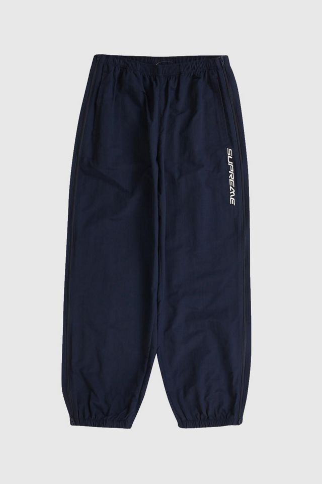 Supreme Full Zip Baggy Warm Up Pant | Urban Outfitters Supreme Full Zip Baggy Warm Up Pant | Urban Outfitters
