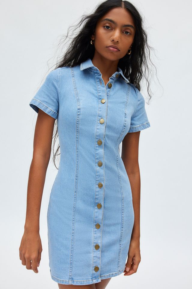 short sleeve denim dress for women The Shirt Daybreak Medium Wash / XS Crafted from stretch denim for a comfortable and flattering fit Mini dress silhouette with a classic point collar and short sleeves Button Short Sleeve Button Front Denim