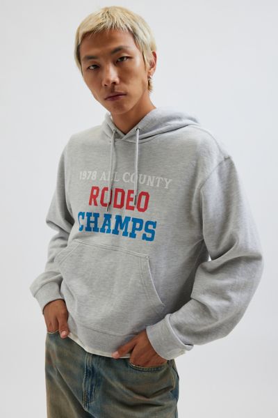 BDG BONFIRE RODEO CHAMPS GRAPHIC PRINT CROPPED HOODIE SWEATSHIRT IN LIGHT GREY, MEN'S AT URBAN OUTFITTER 