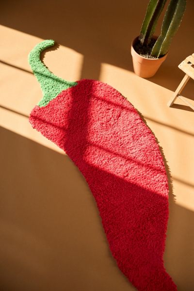 URBAN OUTFITTERS CHILI PEPPER SHAPED TUFTED SHAG RUG IN RED AT URBAN OUTFITTERS 