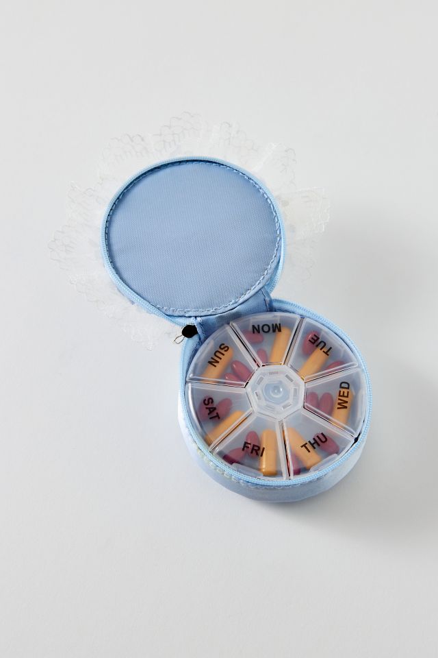 UO Heart Ruffle Pill Case #1