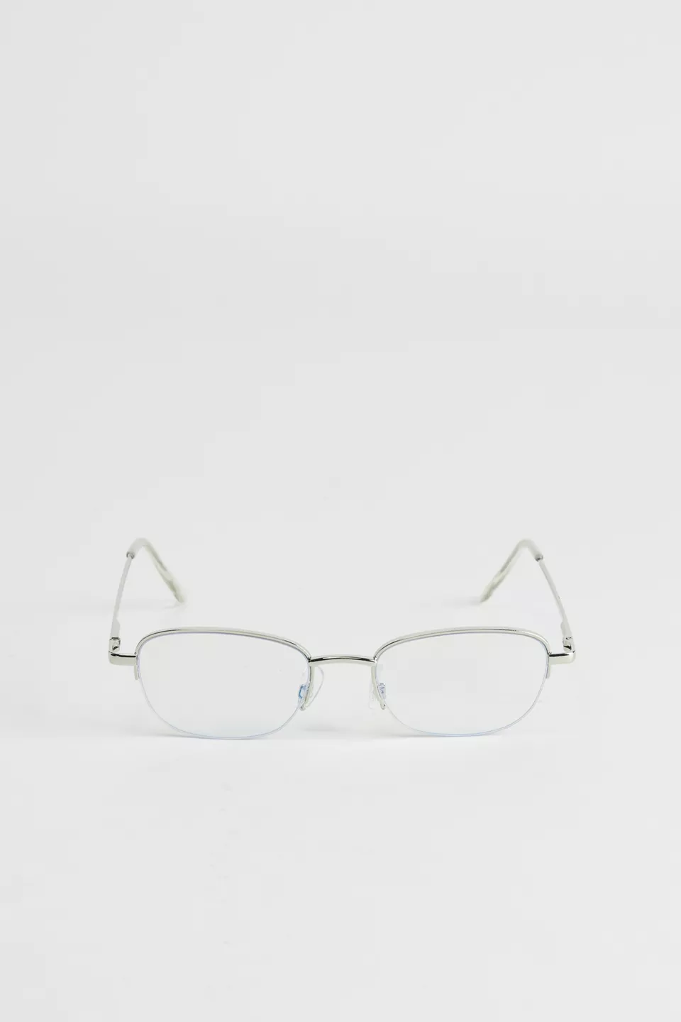 A pair of silver framed glasses