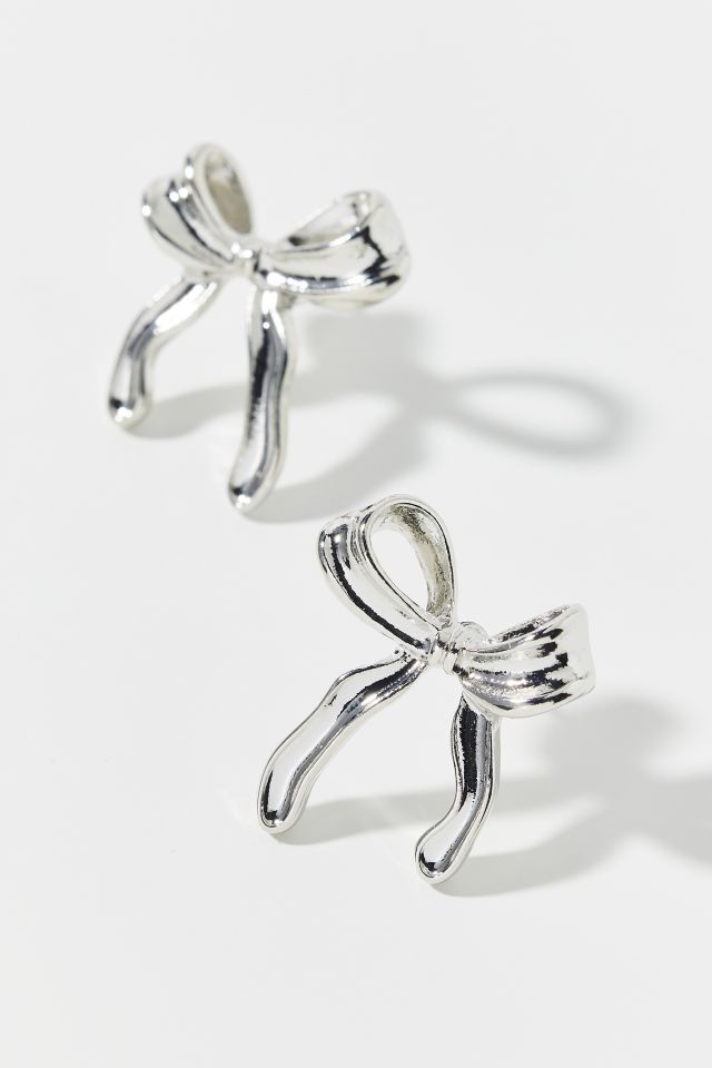 Boucle d'oreille avec nœud en métal #1