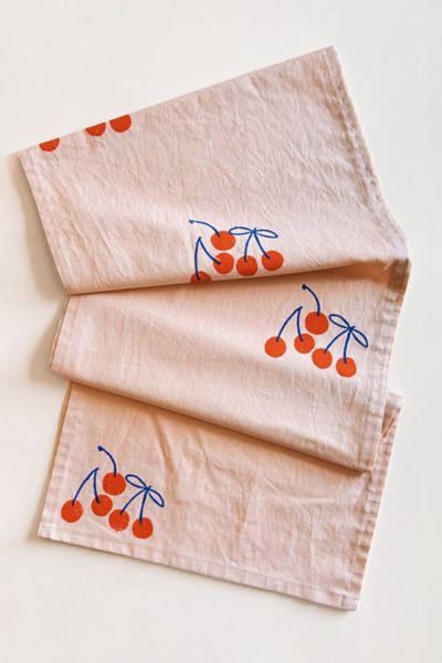 JULIE PEACH BLOCK PRINTED CHERRIES TABLE RUNNER IN PINK AT URBAN OUTFITTERS 