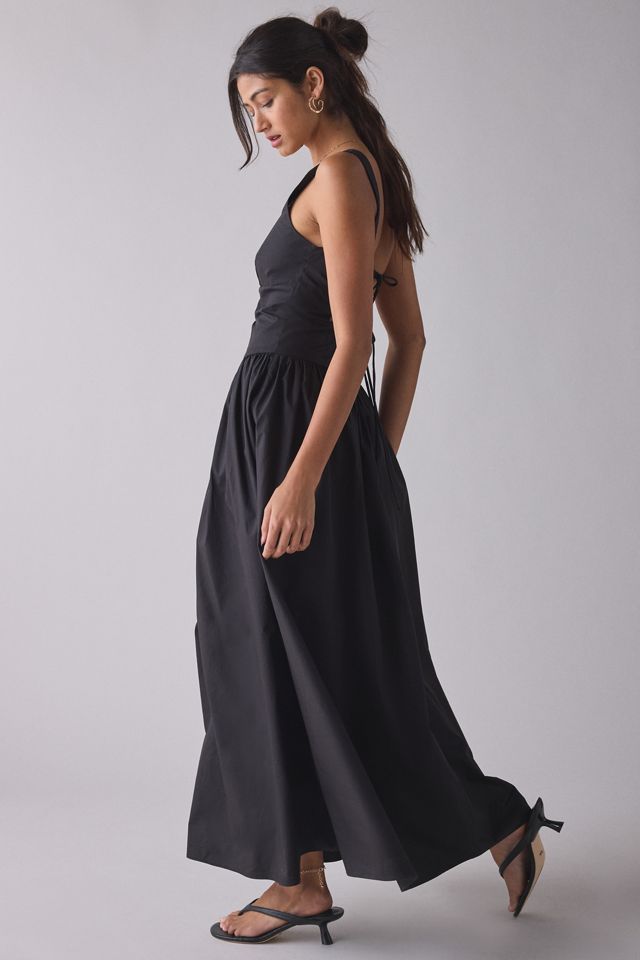 black drop waist maxi dress Orizel Pintuck Sparkle flowing profile perfect for evening events Make a striking entrance in this captivating cape detail maxi dress Glamorous Drop Waist Open Tie-Back