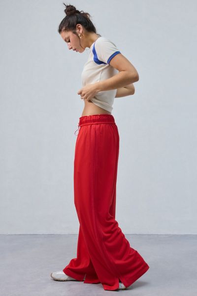 OUT FROM UNDER HOXTON SPORTY MESH SIDE-STRIPE SWEATPANT IN RED, WOMEN'S AT URBAN OUTFITTERS 
