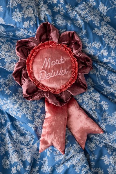 Urban Outfitters Trophy Ribbon Shape Velvet Throw Pillow In Most Delulu At