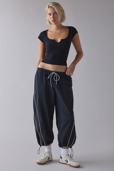 OUT FROM UNDER NOTCH-FRONT COTTON COMPRESSION BABY TEE IN BLACK, WOMEN'S AT URBAN OUTFITTERS 
