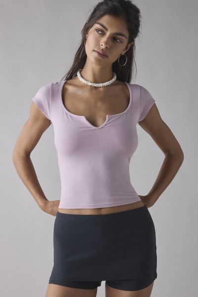 OUT FROM UNDER NOTCH-FRONT COTTON COMPRESSION BABY TEE IN LILAC, WOMEN'S AT URBAN OUTFITTERS 